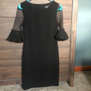 Black fringe sleeve cocktail dress